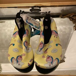 NWT. Size 12 girls swim shoes